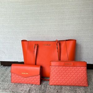 Brand new orange tote with matching bags and crossbody strap